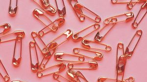 Preview wallpaper pins, metal, gold, pink background