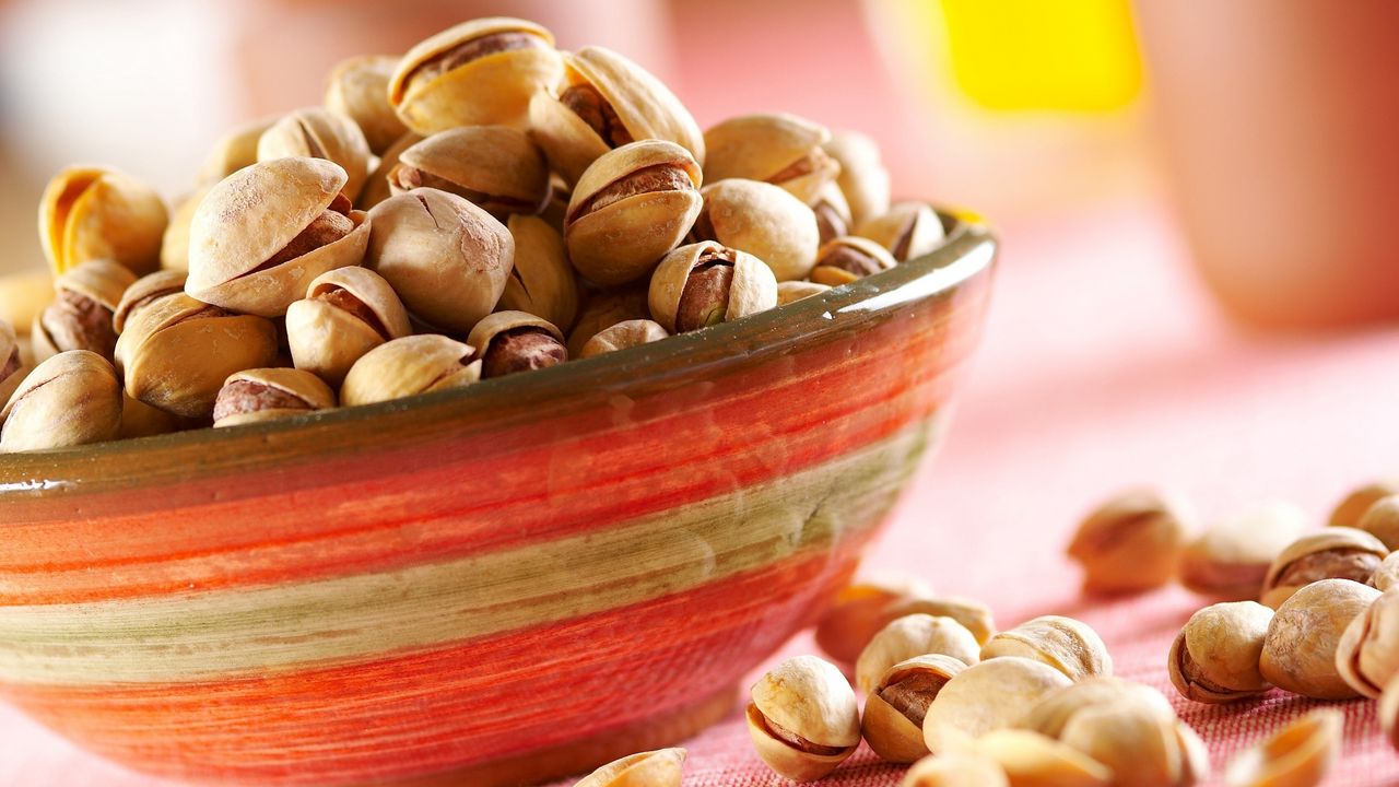 Wallpaper pistachios, nuts, plate, table
