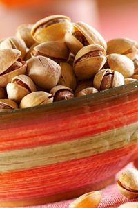 Preview wallpaper pistachios, tasty nuts, bowl