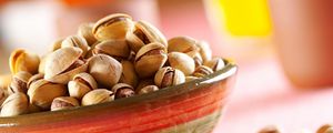 Preview wallpaper pistachios, tasty nuts, bowl