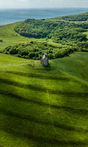 Preview wallpaper plain, hills, grass, castle, trees, landscape