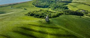 Preview wallpaper plain, hills, grass, castle, trees, landscape