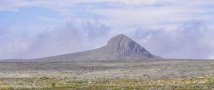 Preview wallpaper plain, valley, stones, mountain, pond, landscape