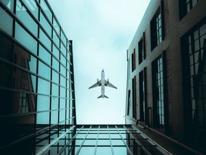 Preview wallpaper plane, bottom view, building, sky