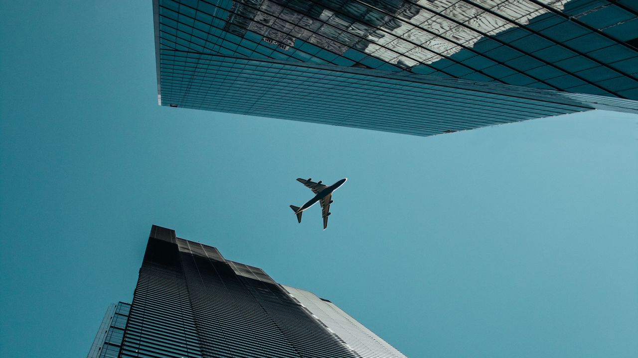 Wallpaper plane, bottom view, buildings, skyscrapers, architecture