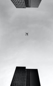 Preview wallpaper plane, buildings, bottom view, black and white, bw