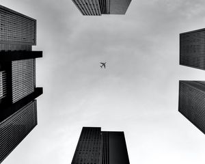 Preview wallpaper plane, buildings, bottom view, black and white, bw