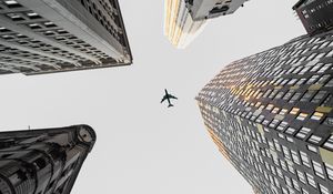 Preview wallpaper plane, buildings, city, bottom view