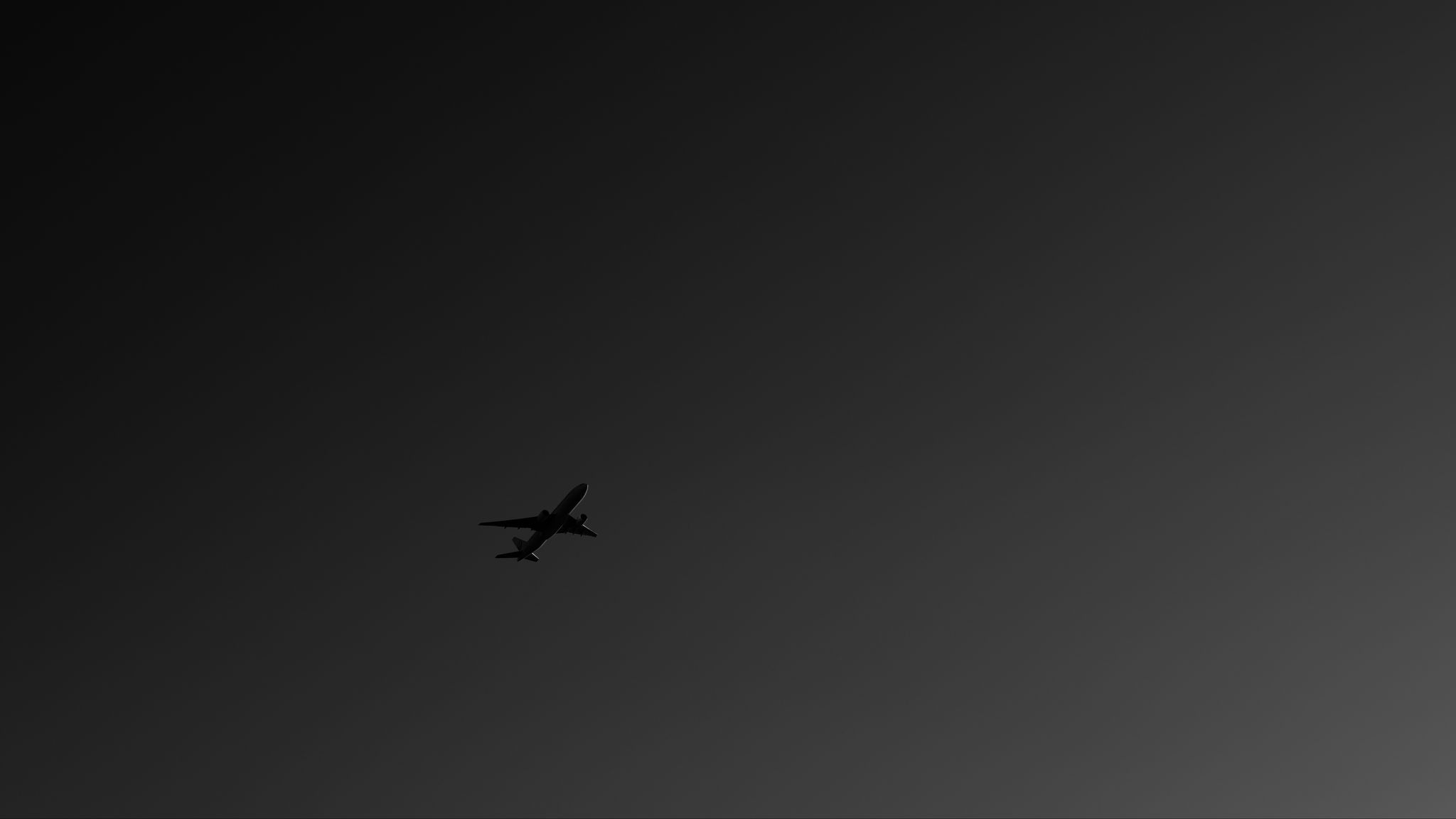 Download wallpaper 2048x1152 plane, bw, sky, flight, dark, minimalism  ultrawide monitor hd background