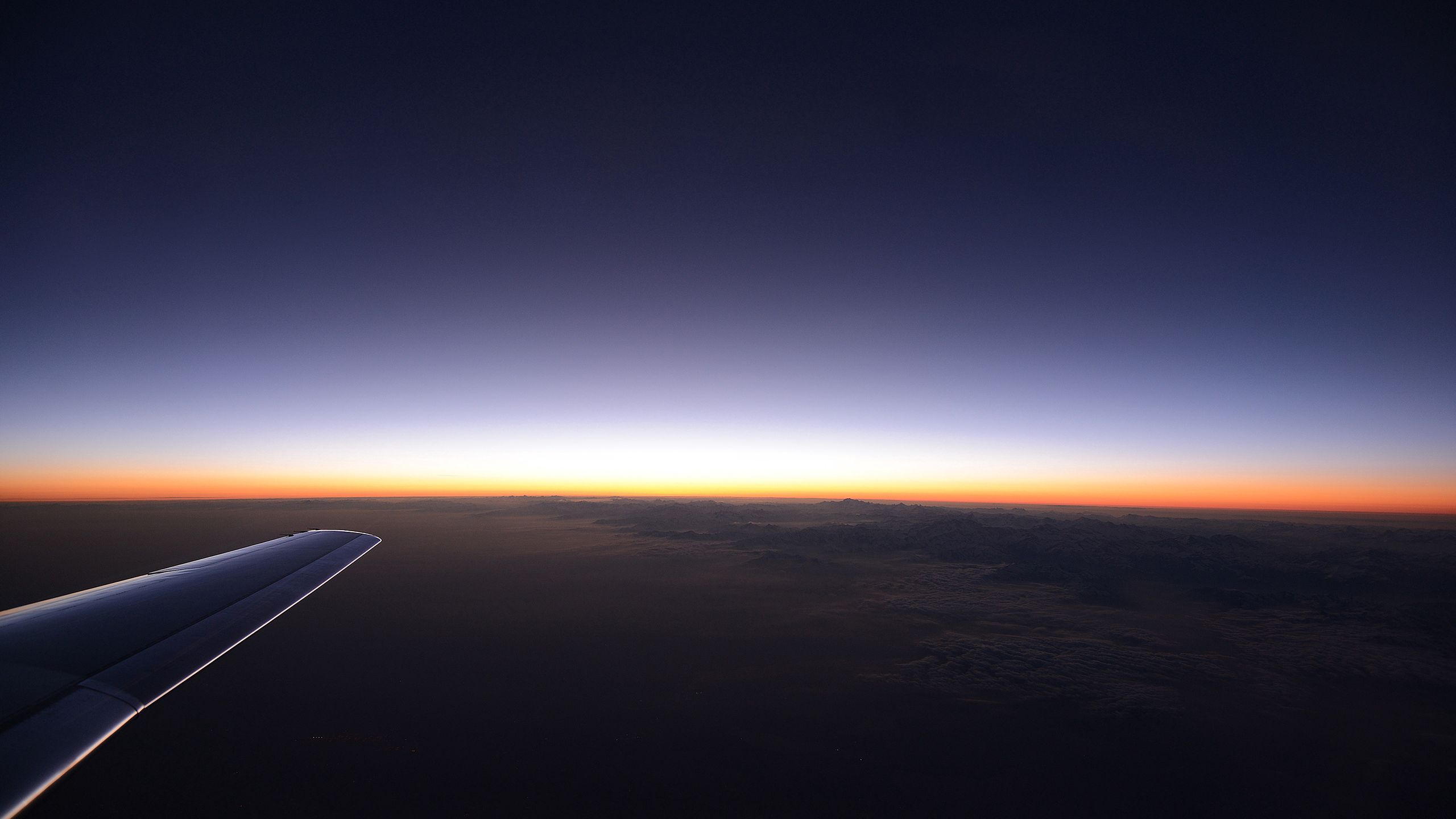 Download wallpaper 2560x1440 plane, flight, sky, beautiful, evening  widescreen 16:9 hd background