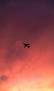 Preview wallpaper plane, flight, sunset, clouds, sky