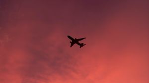 Preview wallpaper plane, flight, sunset, clouds, sky