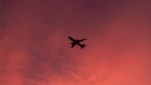 Preview wallpaper plane, flight, sunset, clouds, sky