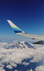 Preview wallpaper plane, mountains, clouds, sky