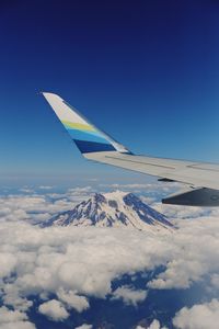 Preview wallpaper plane, mountains, clouds, sky