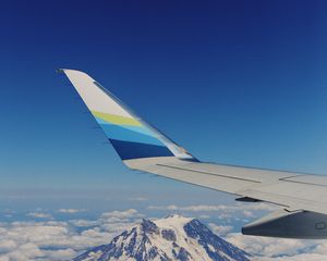 Preview wallpaper plane, mountains, clouds, sky