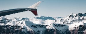 Preview wallpaper plane, mountains, rocks, clouds