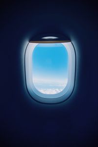 Preview wallpaper plane, porthole, clouds, light, dark