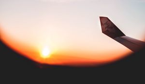 Preview wallpaper plane, porthole, wing, view, sunset