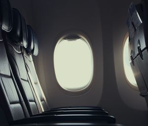 Preview wallpaper plane, seat, porthole, window, light