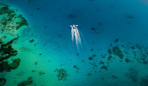 Preview wallpaper plane, trail, sea, water, aerial view