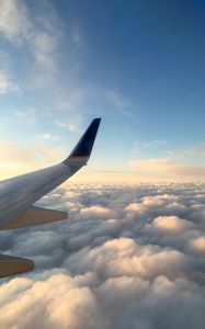 Preview wallpaper plane, wing, clouds, flight, sky