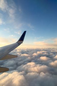 Preview wallpaper plane, wing, clouds, flight, sky