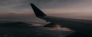 Preview wallpaper plane, wing, clouds, sky, twilight