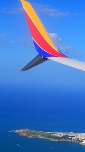 Preview wallpaper plane, wing, island, sea, sky, height