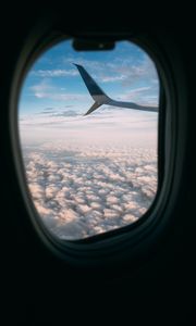 Preview wallpaper plane, wing, porthole, view, clouds