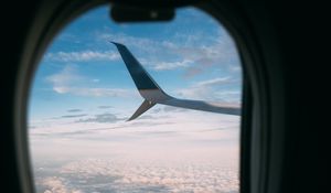 Preview wallpaper plane, wing, porthole, view, clouds