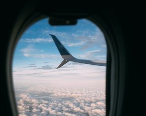 Preview wallpaper plane, wing, porthole, view, clouds