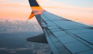 Preview wallpaper plane, wing, sky, clouds, view