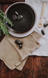 Preview wallpaper plate, stones, plant, cloth, wooden