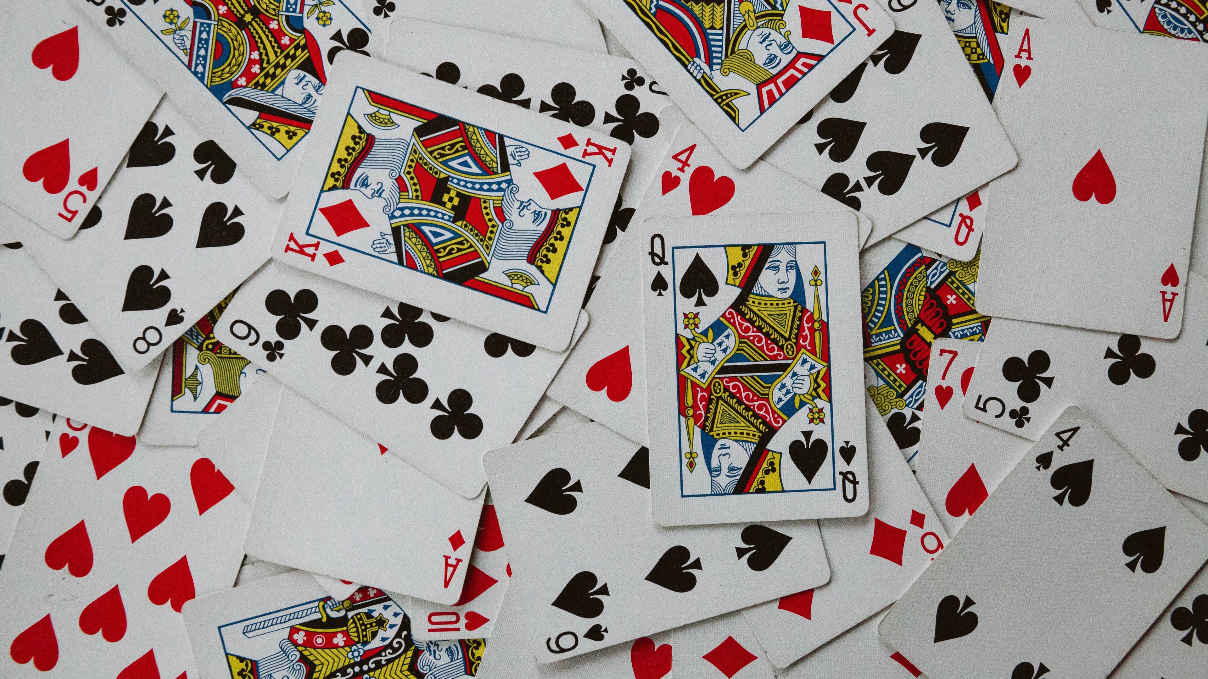Playing Cards on a Black Background  Free Stock Photo