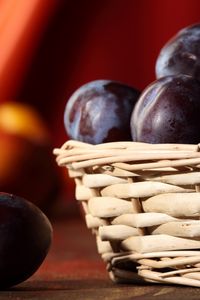 Preview wallpaper plums, basket, close-up
