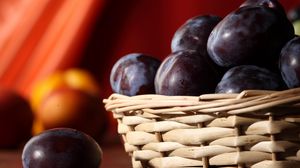 Preview wallpaper plums, basket, close-up