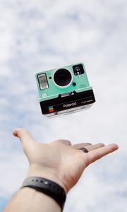 Preview wallpaper polaroid, camera, hand, sky