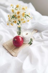 Preview wallpaper pomegranate, candle, flowers, aesthetics