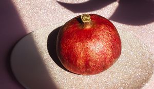 Preview wallpaper pomegranate, fruit, plate, shadow