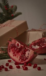 Preview wallpaper pomegranate, fruit, slices, red, boxes, branches