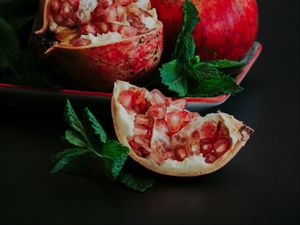 Preview wallpaper pomegranate, slice, fruit, still life, leaves