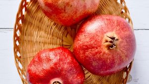 Preview wallpaper pomegranates, fruit, basket