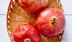 Preview wallpaper pomegranates, fruit, basket