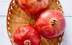 Preview wallpaper pomegranates, fruit, basket