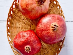Preview wallpaper pomegranates, fruit, basket