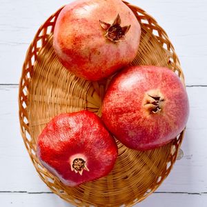 Preview wallpaper pomegranates, fruit, basket