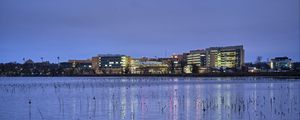 Preview wallpaper pond, buildings, lights, evening, dark