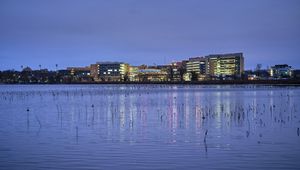 Preview wallpaper pond, buildings, lights, evening, dark