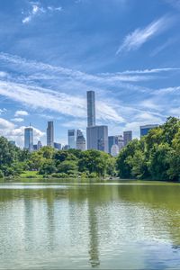 Preview wallpaper pond, buildings, trees, sky, nature, city